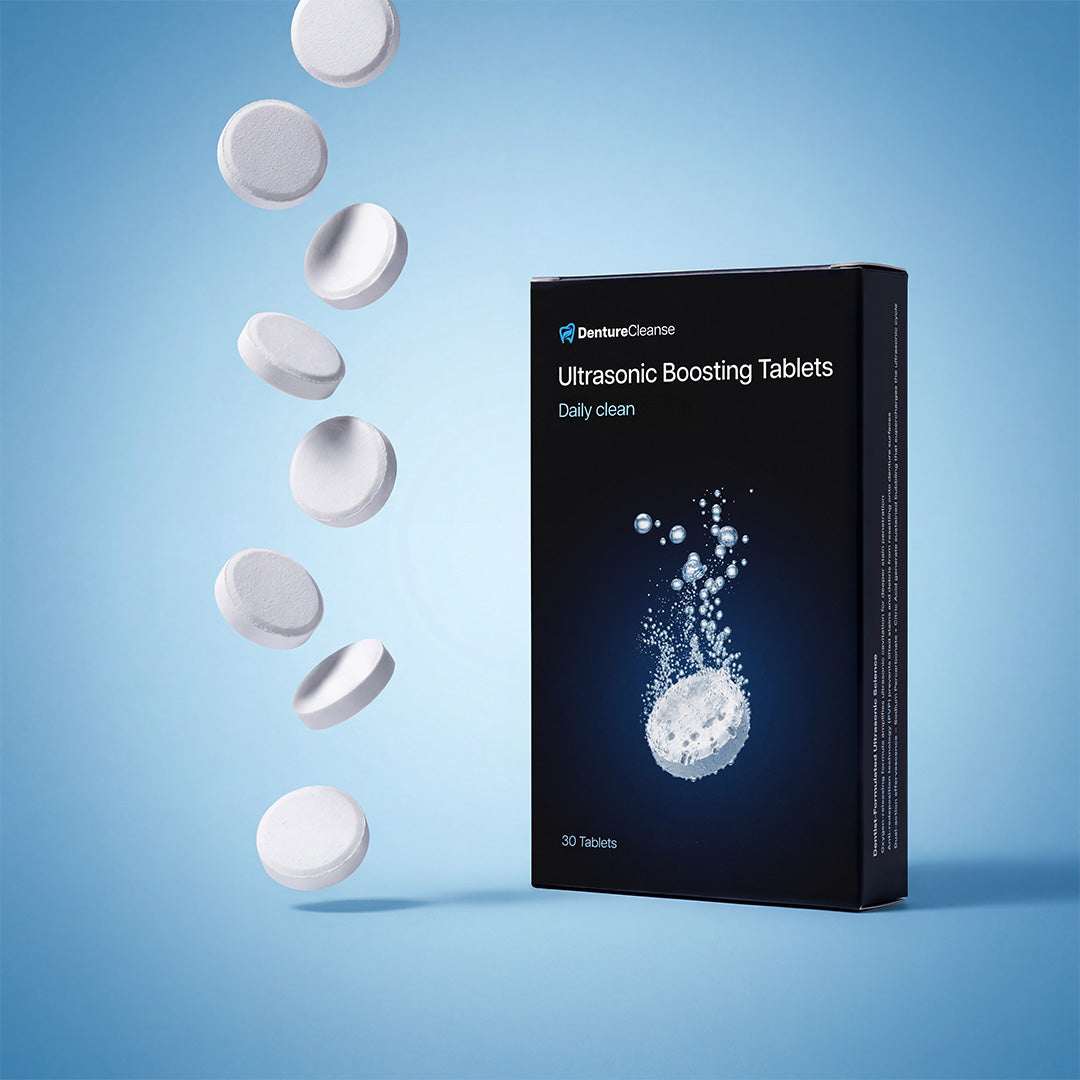 DentureCleanse Boosting Tablets dropping into water